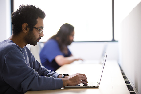 male student at laptop