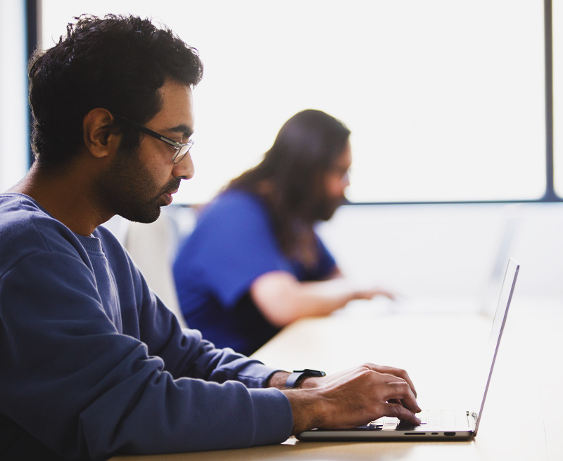 Students studying on their laptops