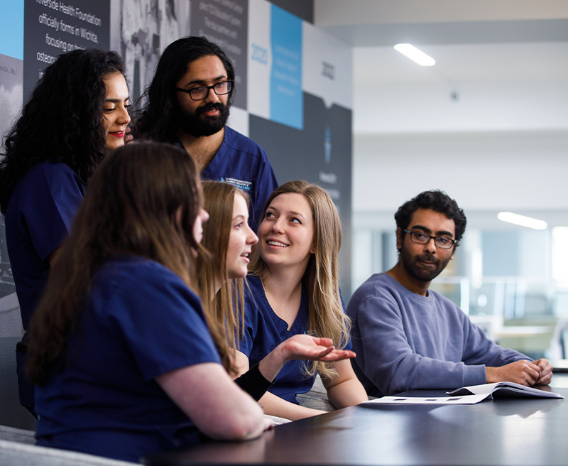 A group of students interacting with each other