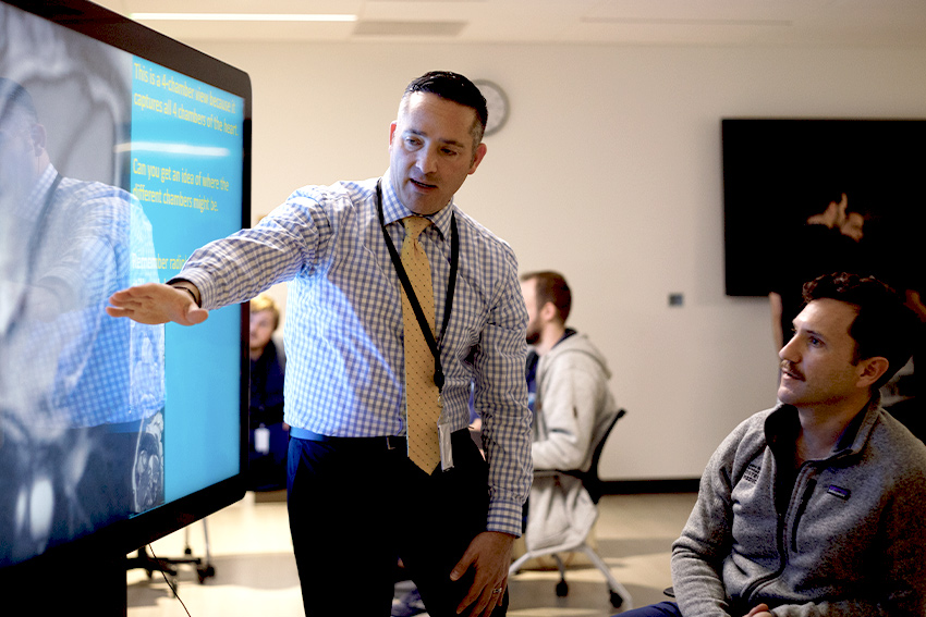 DO teacher talking to a student